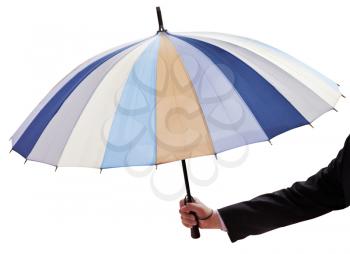 male hand with open multicolored umbrella isolated on white background