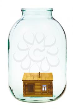 rural wooden house in big open glass jar