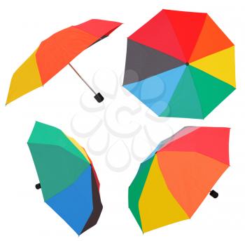 set of open multicolored umbrellas isolated on white background