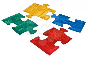 four hand painted jigsaw puzzle pieces isolated on white background