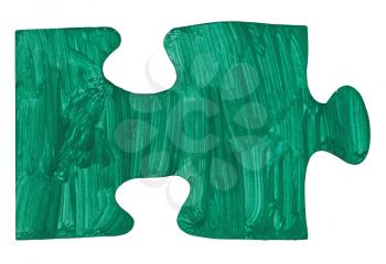 one painted green piece of jigsaw puzzle isolated on white background