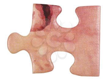 cardboard pink piece of jigsaw puzzle close up isolated on white background