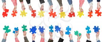 set color puzzle pieces in people hands isolated on white background