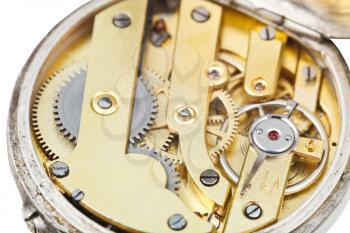 round brass clockwork of retro pocket watch close up
