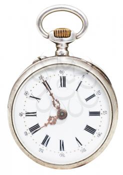 five minutes to eight o'clock on the dial of retro pocket watch isolated on white background