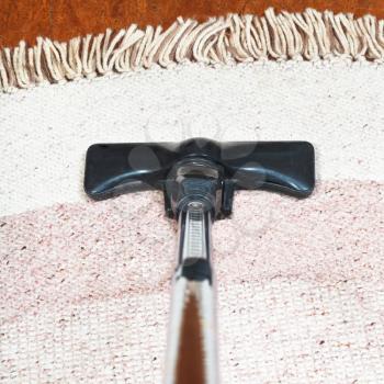carpet vacuuming with a hoover at home