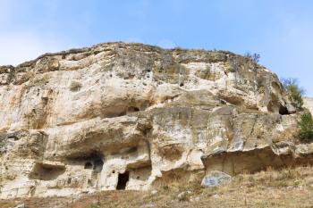Caves of medieval town chufut-kale on mountain in Crimea