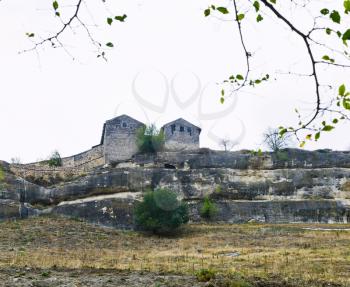 Castle of medieval town chufut-kale on mountain in Crimea