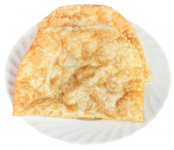 chiburekki pie on white plate isolated on white background