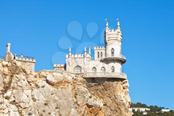 side view of Aurora rock with Swallow's Nest castle on Southern Coast of Crimea