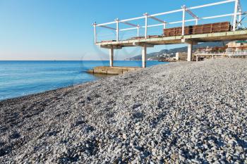 urban Massandrovskiy pebble beach in Yalta, Crimea