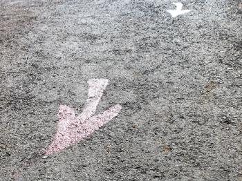 red arrows - road pointers on pavement