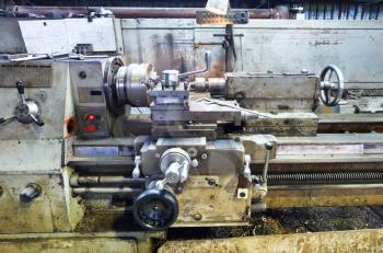 frame of old metal lathe machine in turning workshop