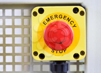red emergency stop push button close up