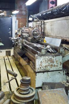 old metal lathe machine in turning workshop