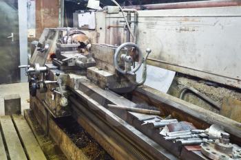 Center metal lathe machine in turnery workshop