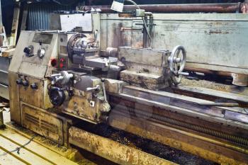 Bench metal lathe machine in turnery workshop