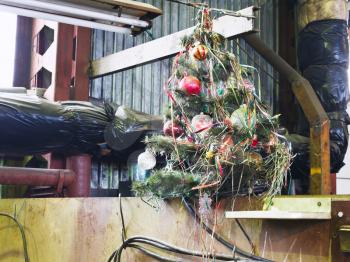 old decorated Christmas tree in turnery workshop