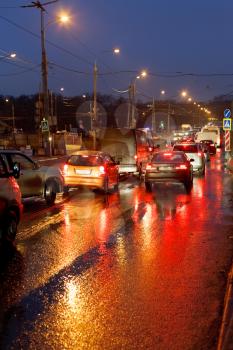 urban traffic in rainy evening in Moscow