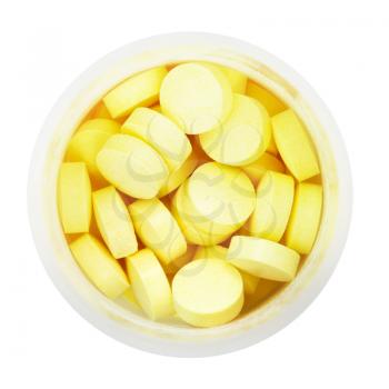 top view of yellow pills in round plastic bottle isolated on white background