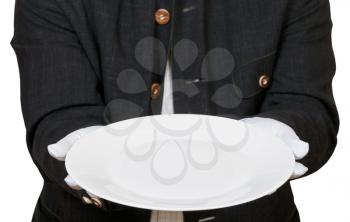 above view of empty white plate in hands in white gloves isolated on white background