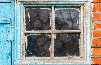 old small shabby window in country house
