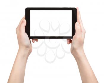 hands holding tablet pc with cut out screen isolated on white background