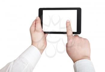 businessman finger press tablet pc with cut out screen isolated on white background
