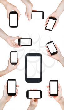 set of hands holding smart phones with cut out screen isolated on white background