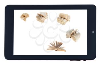flying books on screen of black tablet-pc isolated on white background