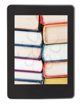 many of books on screen of e-book reader isolated on white background