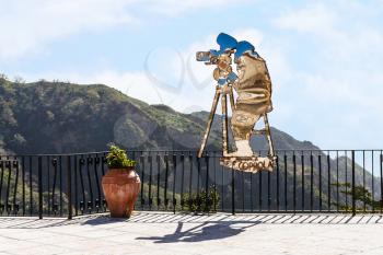 SAVOCA, ITALY - APRIL 4, 2015: Statue of Francis Ford Coppola created by Nino Ucchino - a Local Savoca artist's tribute to Francis Ford Coppola of the GODFATHER movies filmed in part here