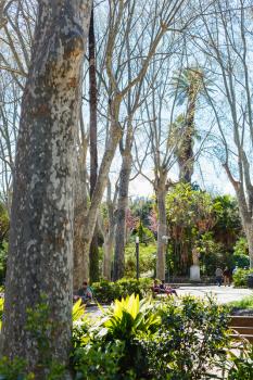 CATANIA, ITALY - APRIL 5, 2015: people in Bellini Garden in Catania, Sicily, Italy. The Bellini Garden is in via Etnea, the most beatiful part of Catania, and its surface is over 70000 square meters