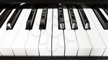 front view of black and white keyboard of digital piano close up