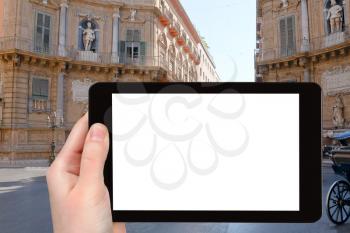 travel concept - tourist photograph central piazza Quattro Canti (Piazza Vigliena) - baroque square in Palermo, Sicily on tablet pc with cut out screen with blank place for advertising logo