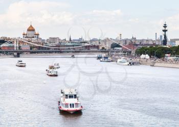 Krymsky Bridge and excursion ships on Moskva River, Moscow city, Russia