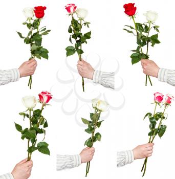 set of two rose flower bouquets in hand isolated on white background
