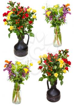 set of bunches of flowers in jugs on white background