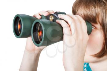 girl looks through binoculars isolated on white background