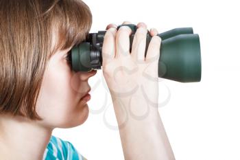side view of girl looks through binoculars isolated on white background