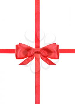one red satin bow in center and two intersecting ribbons isolated on vertical white background