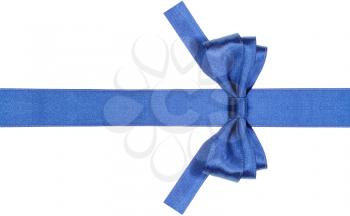 symmetric blue satin bow with square cut ends on silk ribbon isolated on white background
