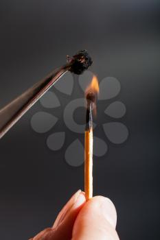 experiment to determine the composition of tissue - match flame ignites cotton fibers