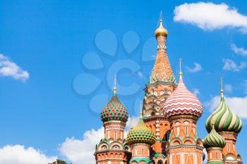 Vasily the Blessed cathedral on Red Square in Moscow and blue sky with white clouds in sunny summer day