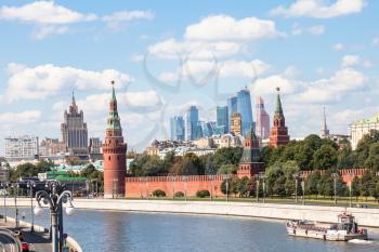 Moscow skyline - view of Kremlin, embankments, skyscrapers, Moscow City district and Moskva River in sunny summer day
