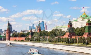 Moscow cityscape - view of Moskva River, embankment, Kremlin, Moscow City district in sunny summer day