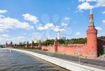 Moscow skyline - Beklemishevskaya Tower and Red Kremlin Walls, The Kremlin embankment, Kremlin churches and buildings in Moscow in sunny summer day