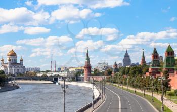 Moscow skyline - The Kremlin Embankment of Moskva River, Greater Stone Bridge, Kremlin Walls and Towers, Cathedral of Christ the Saviour in Moscow, Russia in summer day