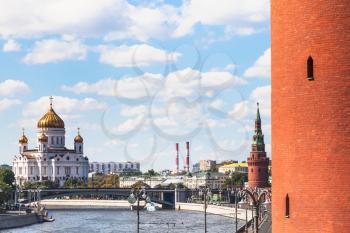 Moscow cityscape - Cathedral of Christ the Saviour and Red wall of Kremlin Tower in Moscow, Russia in summer day