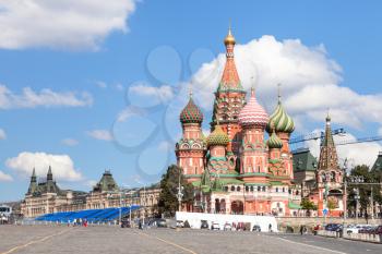 Moscow cityscape - Pokrovsky Cathedral and Vasilevsky Descent of Red Square of Moscow Kremlin in sunny summer day